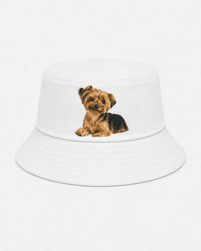 A white bucket hat printed with a portrait of a yorkshire terrier