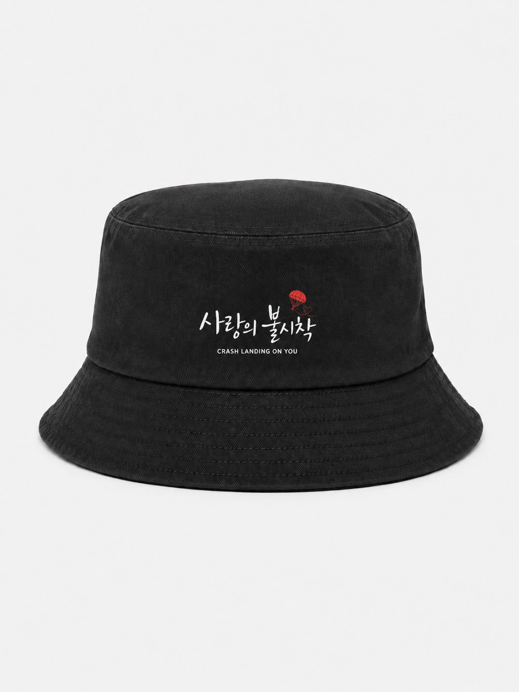 Crash Landing on You Bucket Hat — Black